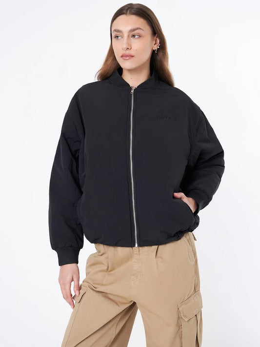 Image of a model wearing Outerwear. Productname: Xgirl Mills Puffy Bomber Jacket in Black colour by brand - Xgirl