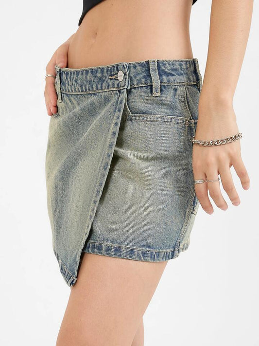 Image of a model wearing Denim. Productname: Worship Vexed Denim Mini Skirt in Garbage Grime Blue colour by brand - Worship