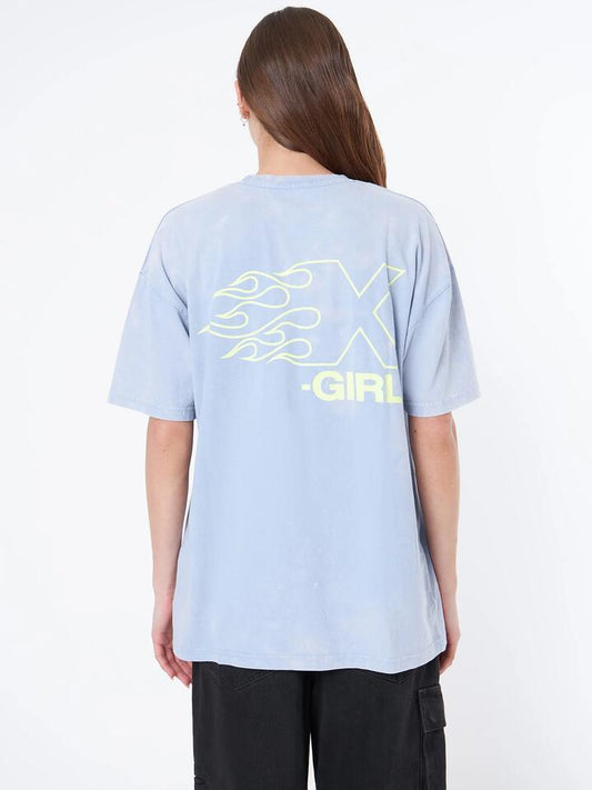 Image of a model wearing Tops. Productname: Xgirl Burning X Logo Relaxed Tee in Powder Blue colour by brand - Xgirl
