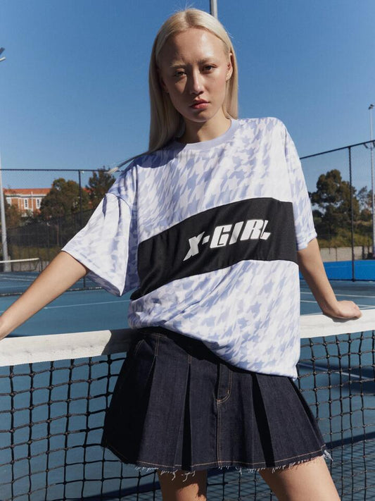 Image of a model wearing Tops. Productname: Xgirl Contrast Panel Oversized Football T-Shirt in Powder Blue colour by brand - Xgirl