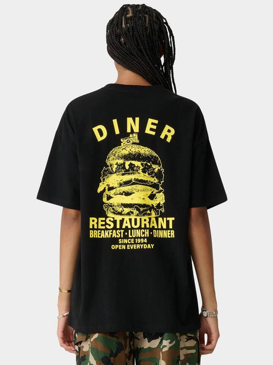 Image of a model wearing Tops. Productname: Xgirl Diner Relaxed Tee in Black colour by brand - Xgirl