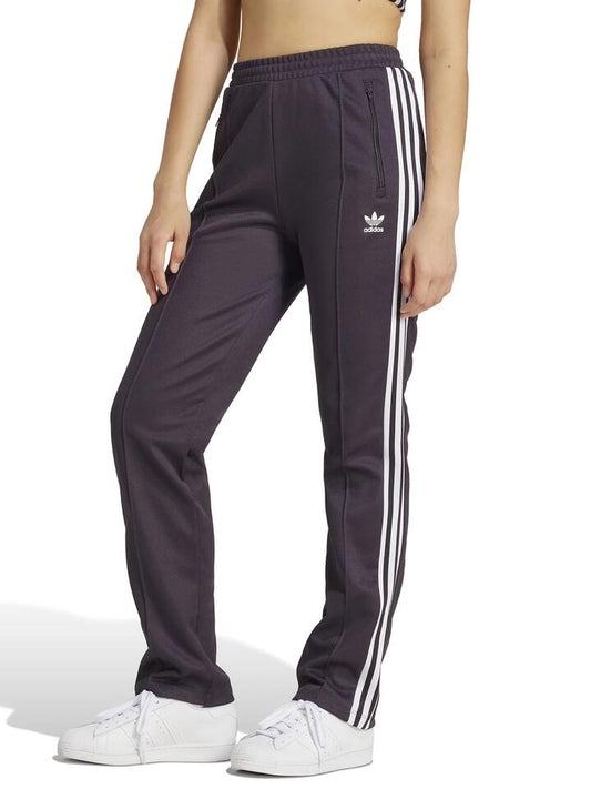 Image of a model wearing Pants. Productname: Adidas Beckenbauer Track Pants in Aurora Black colour by brand - Adidas