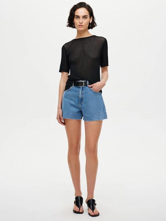 Image of a model wearing Shorts. Productname: Neuw Ryder Short Tranquil in Mid Indigo colour by brand - Neuw