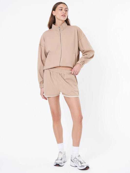 Image of a model wearing Shorts. Productname: First Mse Mse Track Short in Bisque colour by brand - First Mse
