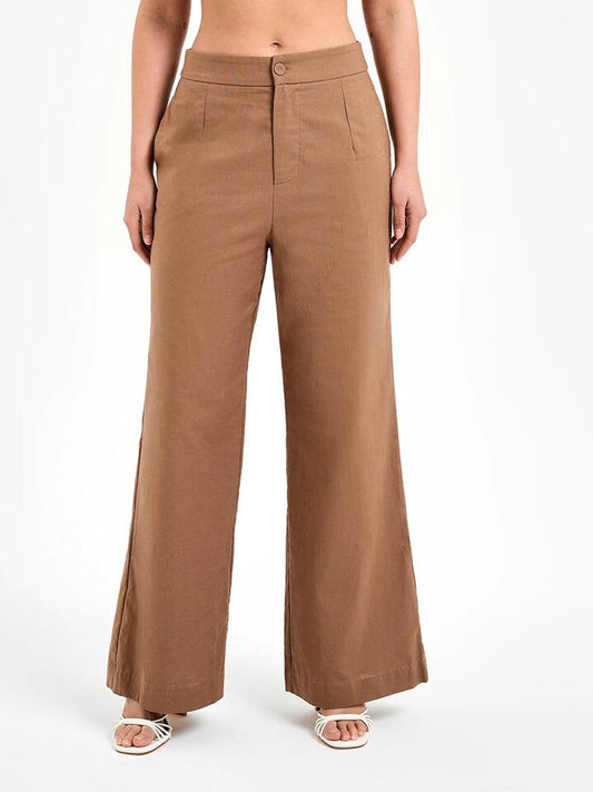 Image of a model wearing Pants. Productname: Lulu & Rose Kiara Pants in Mocha colour by brand - Lulu & Rose