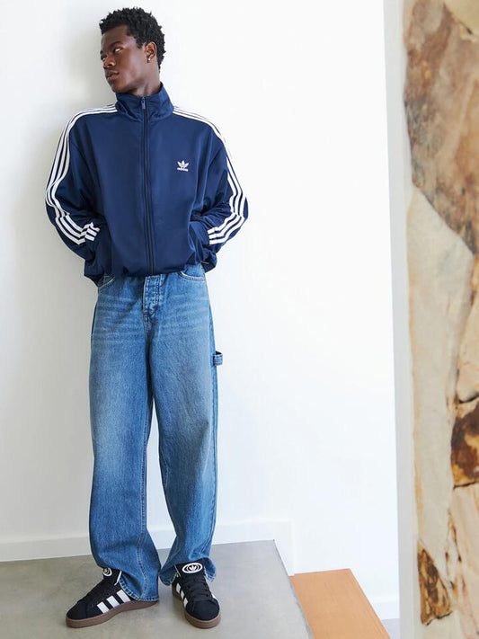 Image of a model wearing Denim. Productname: Ksubi Maxx Mids in Medium Wash colour by brand - Ksubi