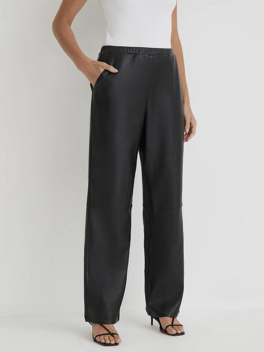 Image of a model wearing Pants. Productname: 4th & Reckless Lori Trouser in Black colour by brand - 4th & Reckless