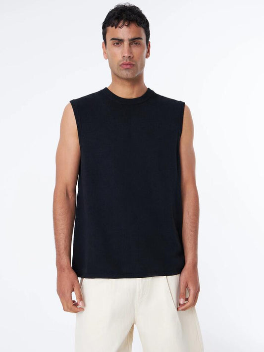 Image of a model wearing Tops. Productname: Article One Kristoph Knit Muscle in Black colour by brand - Article One