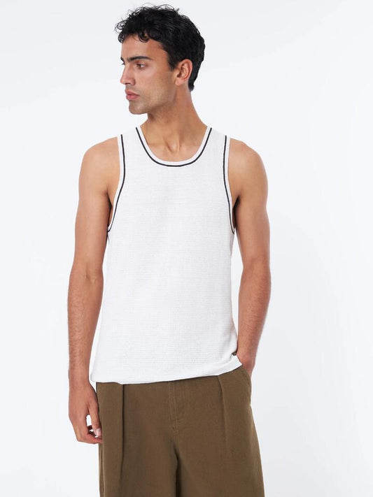 Image of a model wearing Tops. Productname: Article One Grier Knit Singlet in White colour by brand - Article One