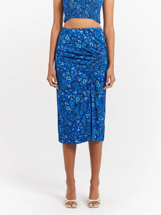 Image of a model wearing Skirts. Productname: Lulu & Rose Elyna Ruched Midi Skirt in Azure Floral colour by brand - Lulu & Rose