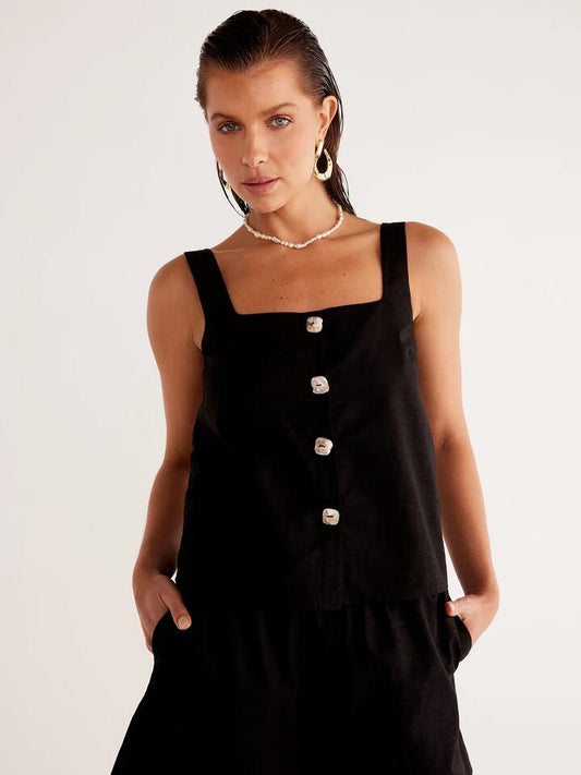 Image of a model wearing Tops. Productname: SNDYS Shelley Top in Black colour by brand - SNDYS
