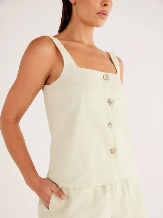 Image of a model wearing Tops. Productname: SNDYS Shelley Top in Matcha colour by brand - SNDYS