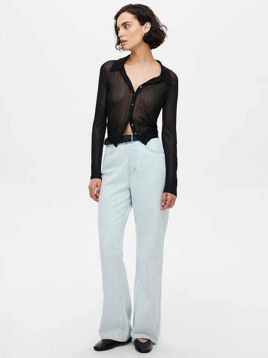 Image of a model wearing Denim. Productname: Neuw Coco Relaxed Future in Bleached Vintage Indigo colour by brand - Neuw