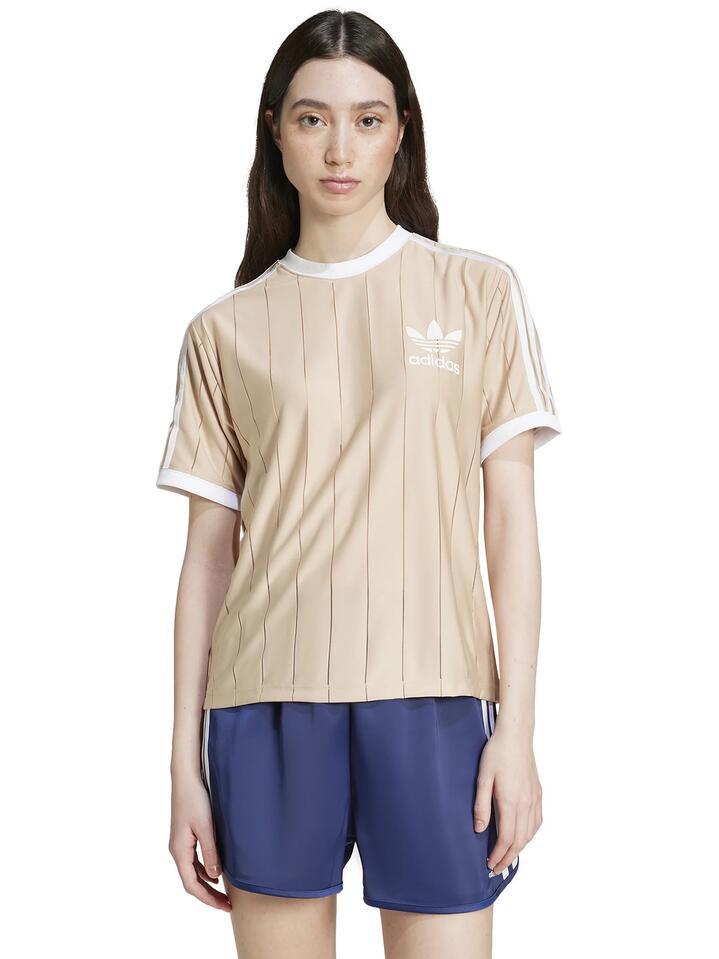 Image of a model wearing Tops. Productname: Adidas 3 Stripe Pinstripe Tee in Magic Beige colour by brand - Adidas