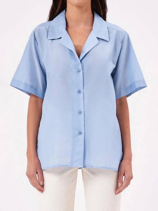 Image of a model wearing Tops. Productname: Neuw Sheer Resort Shirt in Cornflower colour by brand - Neuw