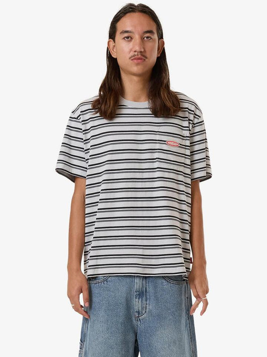 Image of a model wearing Tops. Productname: Worship Chalice Stripe Pocket Tee in Vapour colour by brand - Worship