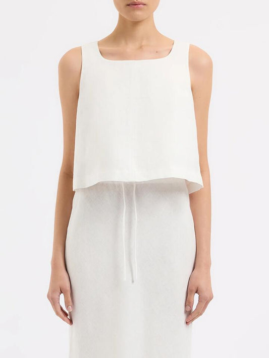 Image of a model wearing Tops. Productname: Nude Lucy Thilda Linen Top in White colour by brand - Nude Lucy