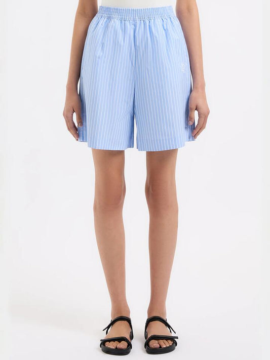 Image of a model wearing Shorts. Productname: Nude Lucy Sutton Poplin Short in Blue Stripe colour by brand - Nude Lucy
