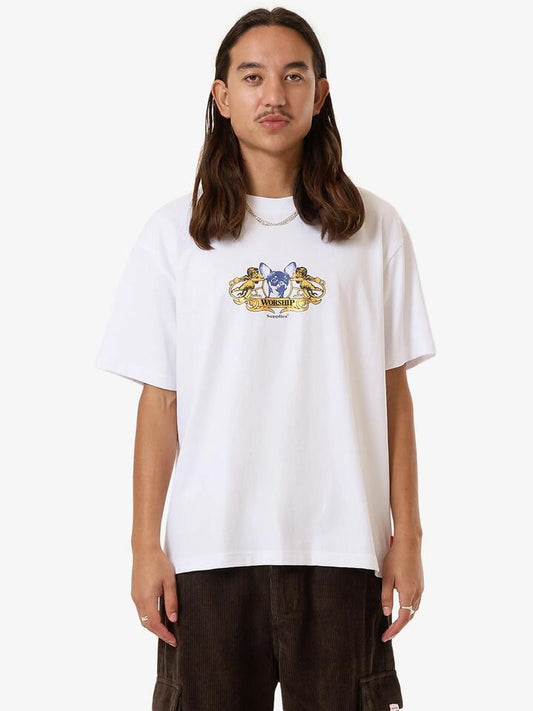 Image of a model wearing Tops. Productname: Worship Hank Tee in White colour by brand - Worship