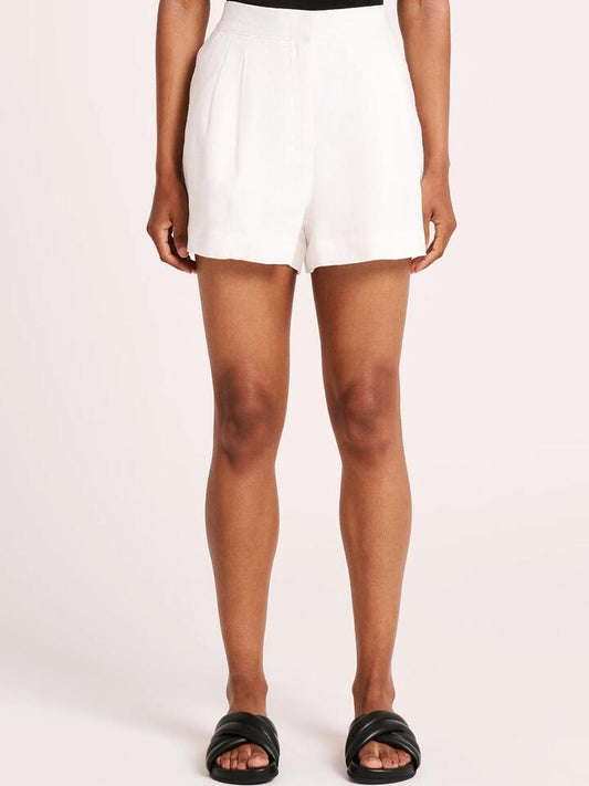 Image of a model wearing Shorts. Productname: Nude Lucy Thilda Tailored Shorts in White colour by brand - Nude Lucy