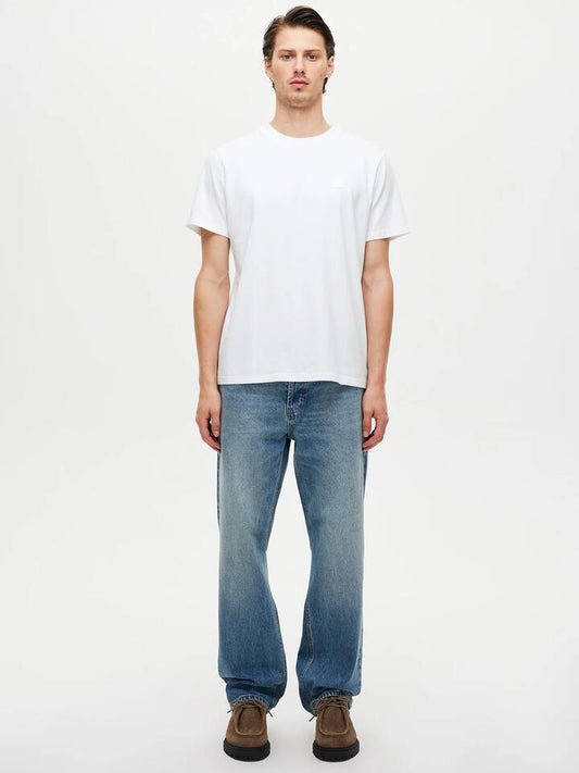 Image of a model wearing Denim. Productname: Neuw River Relaxed Cortez in Light Vintage Indigo colour by brand - Neuw