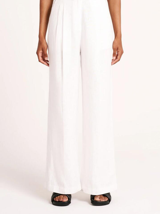 Image of a model wearing Pants. Productname: Nude Lucy Thilda Linen Pants in White colour by brand - Nude Lucy
