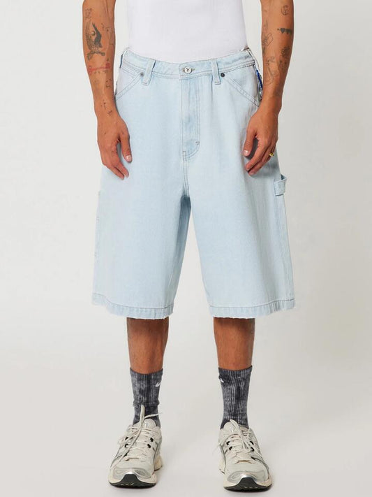 Image of a model wearing Shorts. Productname: Abrand A6 Big Work Short Hank in Bleached Vintage Blue colour by brand - Abrand