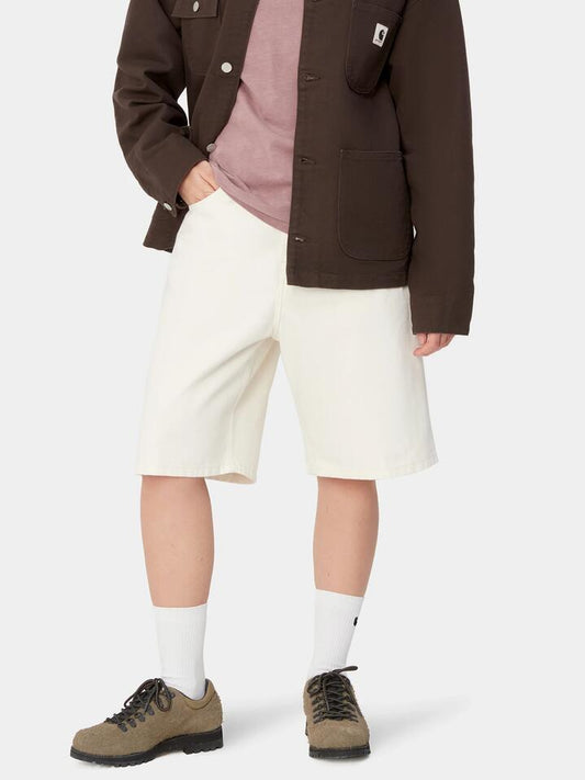 Image of a model wearing Shorts. Productname: Carhartt Wip Brandon Short - White in White colour by brand - Carhartt Wip