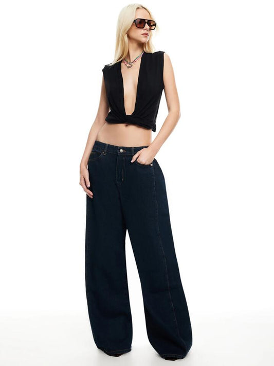 Image of a model wearing Tops. Productname: Lioness Tiny Dancer Top in Onyx colour by brand - Lioness