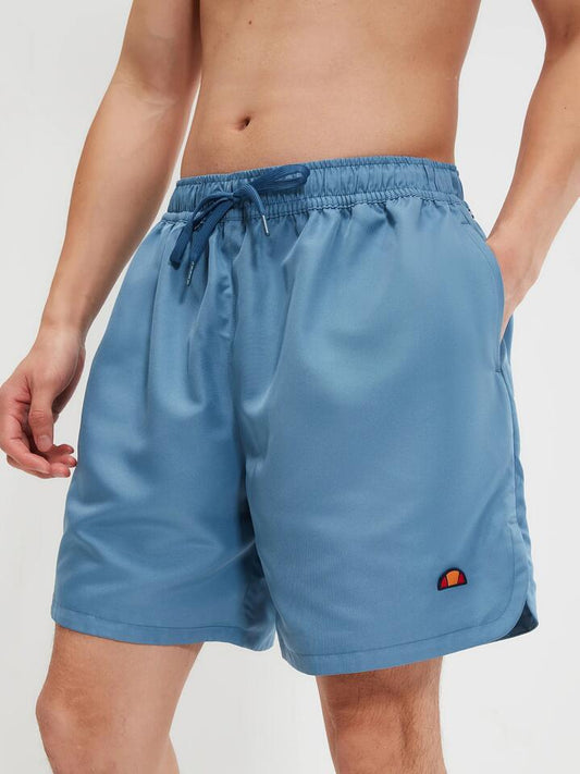 Image of a model wearing Shorts. Productname: Ellesse Eames Swimshort in Dark Blue colour by brand - Ellesse