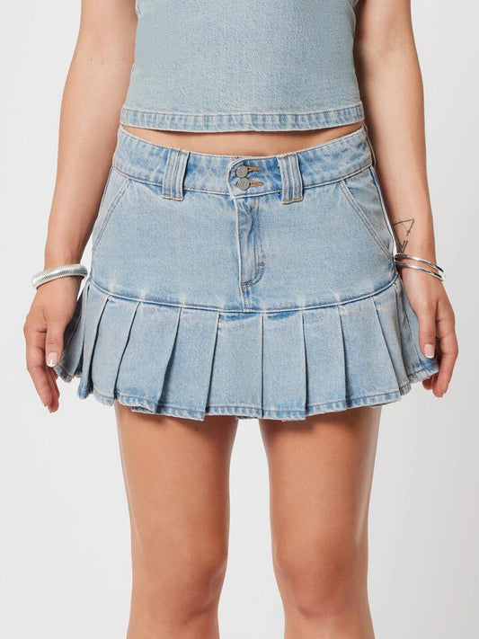 Image of a model wearing Skirts. Productname: Abrand 95 Pleated Mini Skirt Dixie in Tint Light Blue colour by brand - Abrand