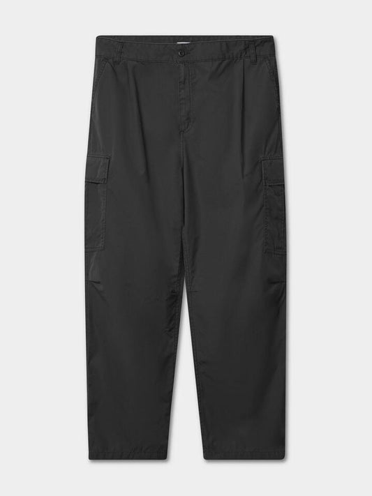 Image of a model wearing Pants. Productname: Carhartt Wip Cole Cargo Pant in Black colour by brand - Carhartt Wip