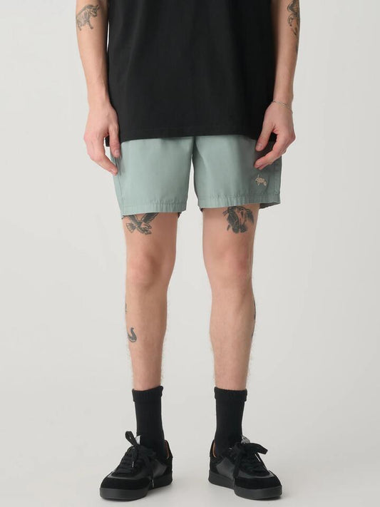 Image of a model wearing Shorts. Productname: S-Double By Shawn Stussy Poplin Coast Boxer in Sage Green colour by brand - S-Double By Shawn Stussy