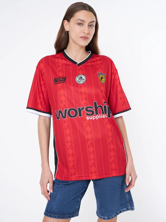 Image of a model wearing Tops. Productname: Worship Player Football Jersey in Worship Red colour by brand - Worship