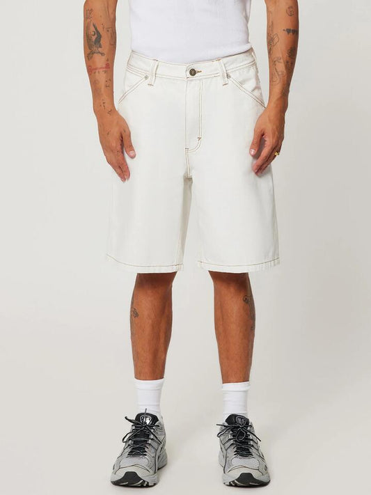 Image of a model wearing Shorts. Productname: Abrand A5 Baggy Short Guy in Ghost White colour by brand - Abrand