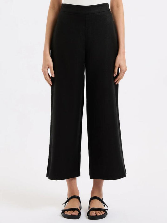 Image of a model wearing Pants. Productname: Nude Lucy Thilda Linen Culotte in Black colour by brand - Nude Lucy