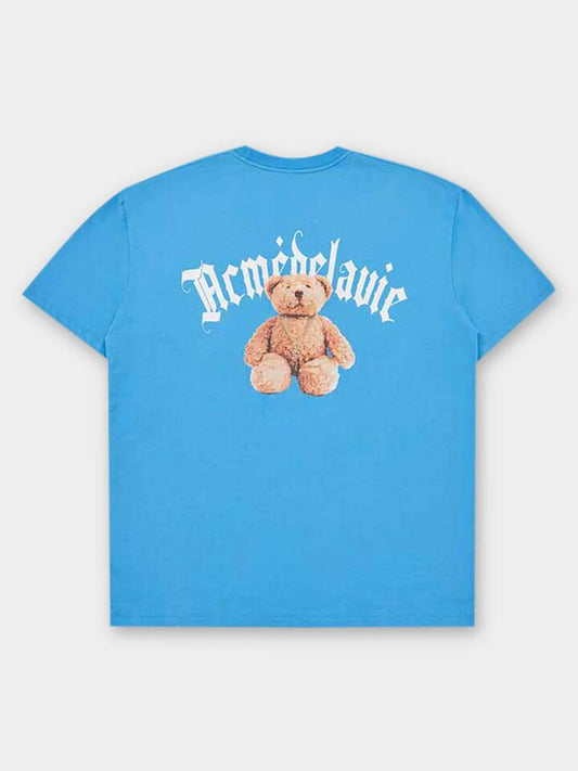 Image of a model wearing Tops. Productname: ADLV Gold Chain Bear Doll Tee in Blue colour by brand - ADLV