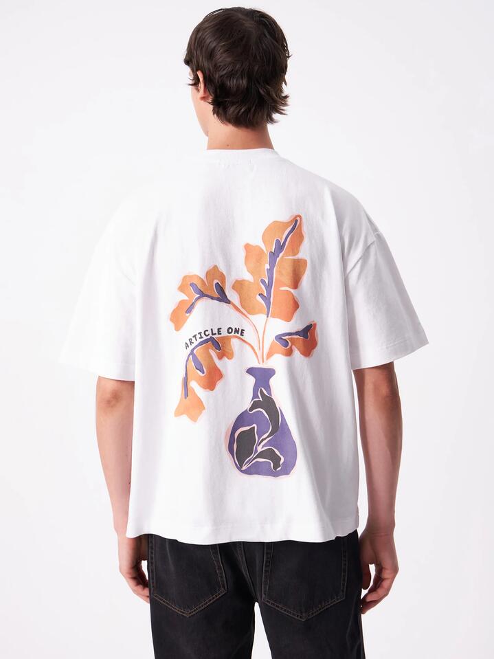 Image of a model wearing Tops. Productname: Article One Nouveux Logo Tee in White colour by brand - Article One