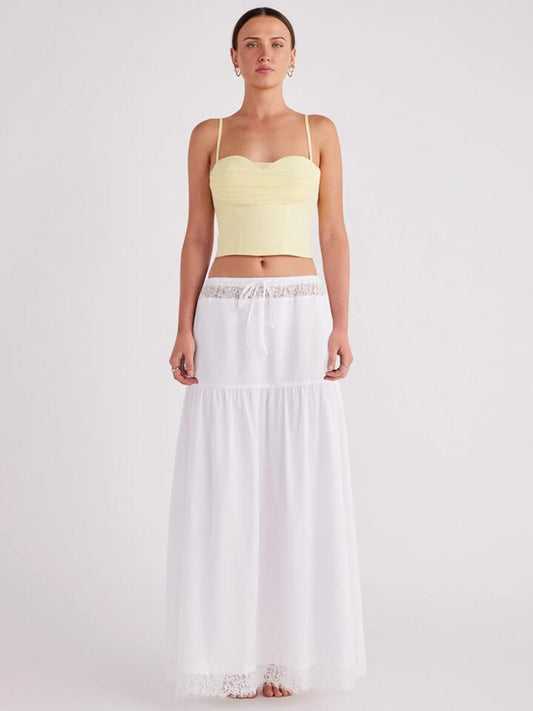 Image of a model wearing Tops. Productname: SNDYS Elsie Top in Buttercream colour by brand - SNDYS