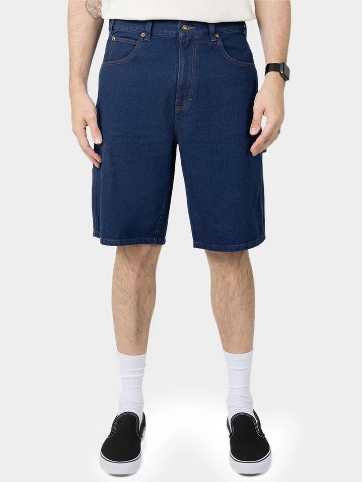Image of a model wearing Denim. Productname: Dickies Light Denim Carpenter Short in Dark Indigo colour by brand - Dickies