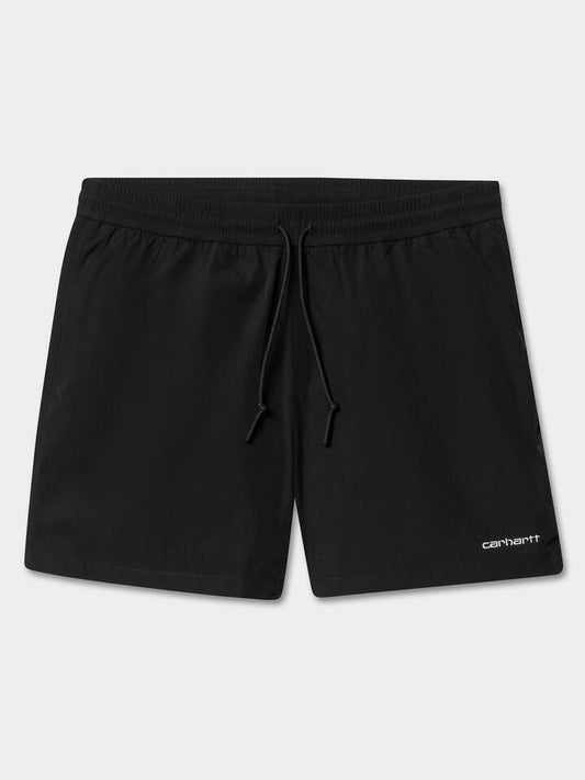 Image of a model wearing Shorts. Productname: Carhartt Wip Tobes Swim Trunks in Black/White colour by brand - Carhartt Wip