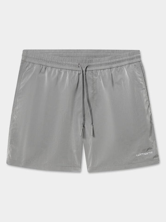Image of a model wearing Shorts. Productname: Carhartt Wip Tobes Swim Trunks in Sonic Silver/White colour by brand - Carhartt Wip