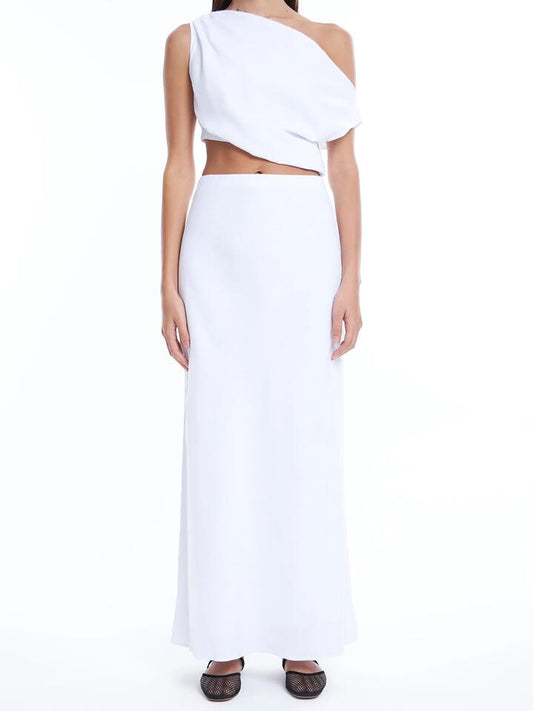 Image of a model wearing Skirts. Productname: Lulu & Rose Lucy Maxi Skirt in Off White colour by brand - Lulu & Rose