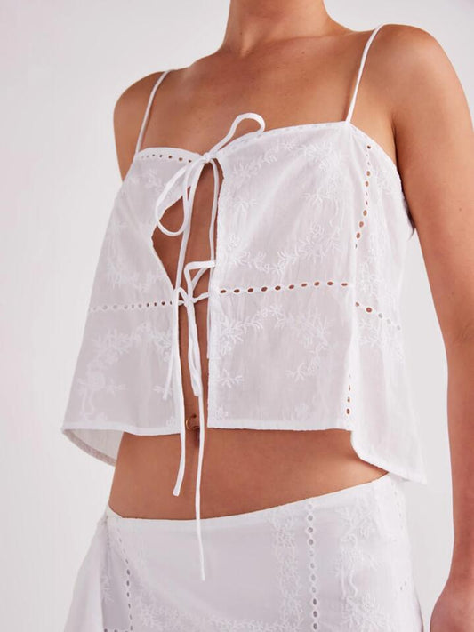 Image of a model wearing Tops. Productname: SNDYS Asta Top in White colour by brand - SNDYS