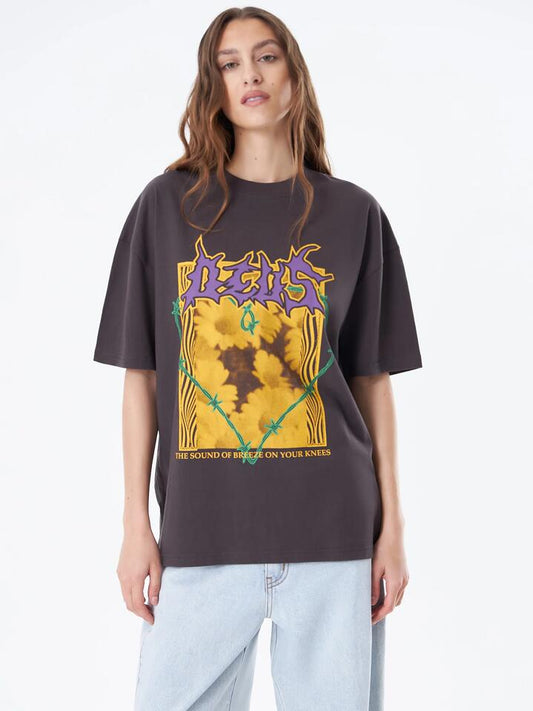 Image of a model wearing Tops. Productname: Deus Spring Clean Tee in Anthracite colour by brand - Deus