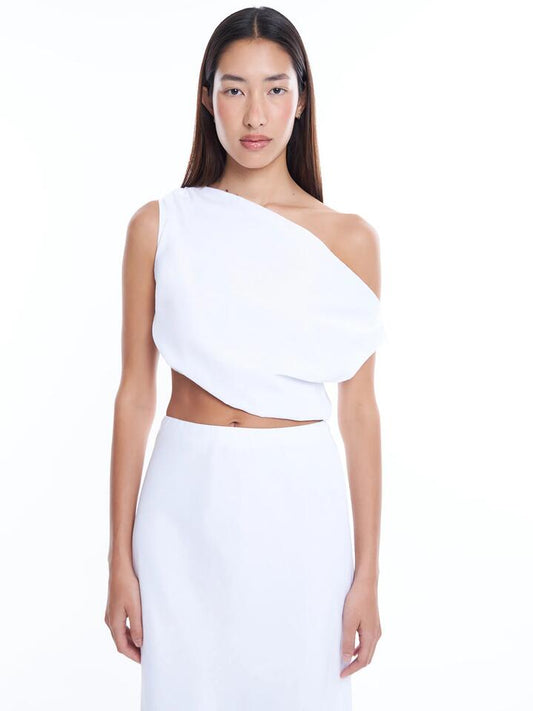 Image of a model wearing Tops. Productname: Lulu & Rose Lucy Asymmetrical Top in Off White colour by brand - Lulu & Rose