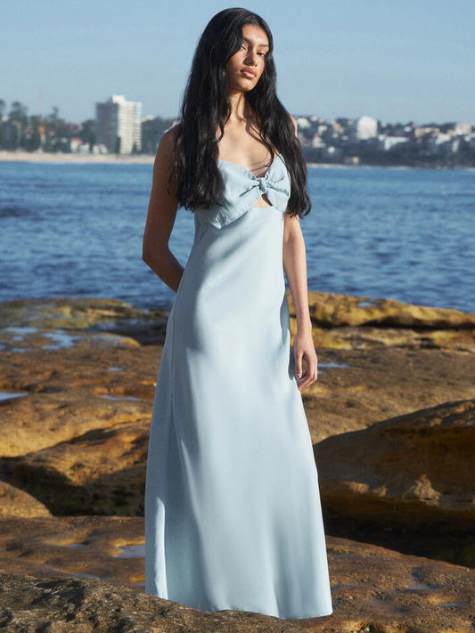 Image of a model wearing Dress. Productname: Lulu & Rose Meg Midi Dress in Icy Aqua colour by brand - Lulu & Rose