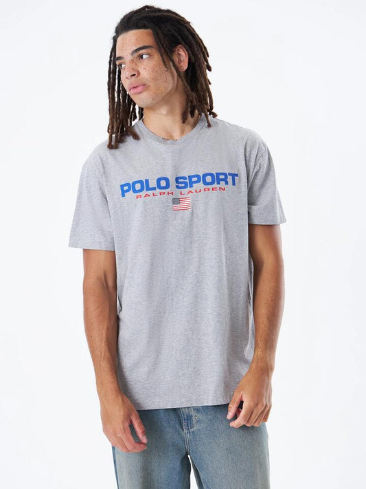 Image of a model wearing Tops. Productname: Polo Ralph Lauren Polo Sport M1 Tshirt in Andover Heather/Red colour by brand - Polo Ralph Lauren