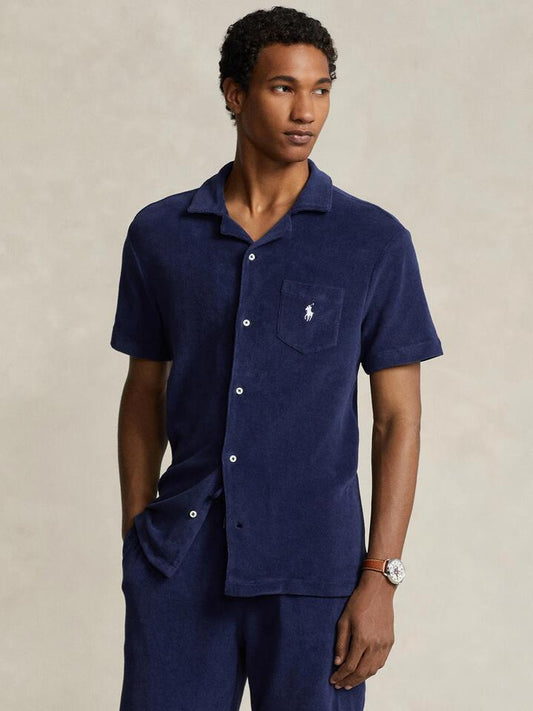 Image of a model wearing Shorts. Productname: Polo Ralph Lauren Short Sleeve Cotton Terry in Newport Navy colour by brand - Polo Ralph Lauren