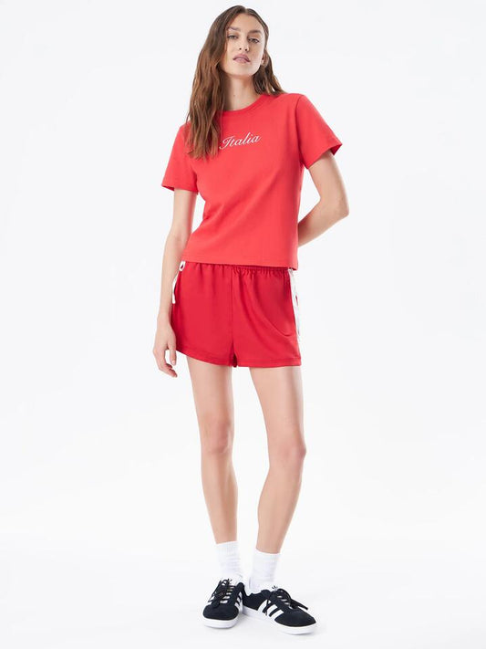 Image of a model wearing Shorts. Productname: Beyond Her Nori Mini Short in Cherry Red colour by brand - Beyond Her
